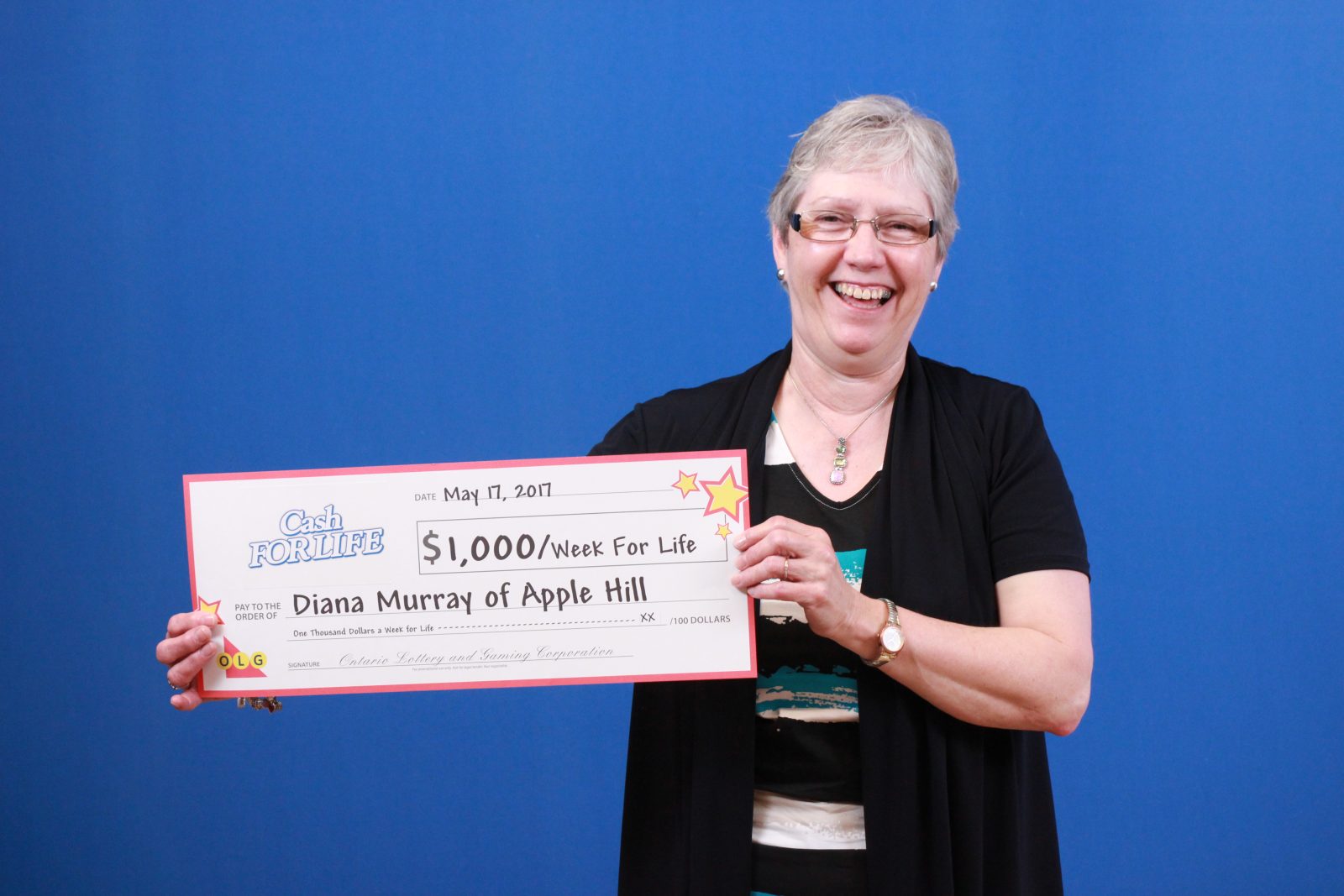 Apple Hill resident wins $1, 000 a week for life