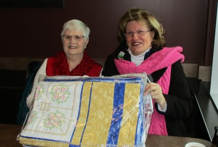 Seniors Club presents raffled quilt
