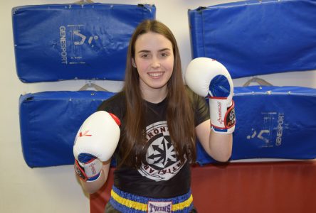 Local kickboxing champion claims national title