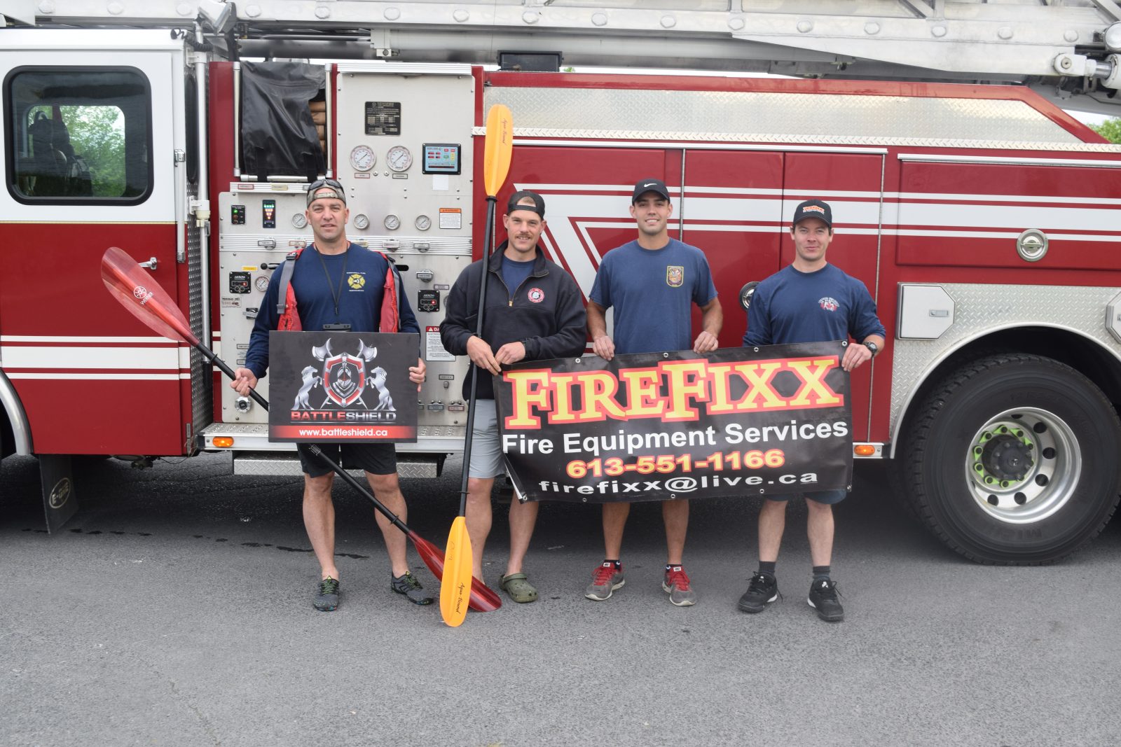 Firefighters paddle towards Montreal