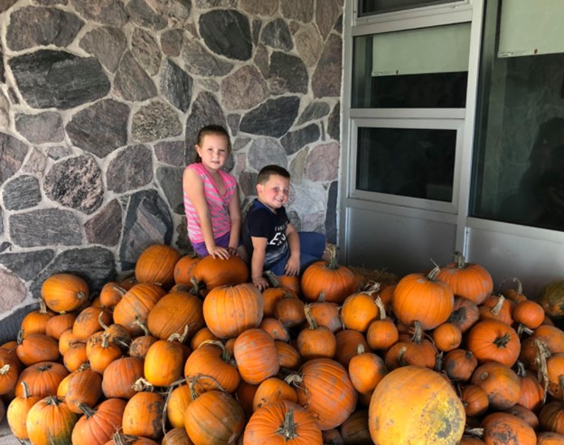 Local parent collects pumpkins to give students a fun Halloween activity