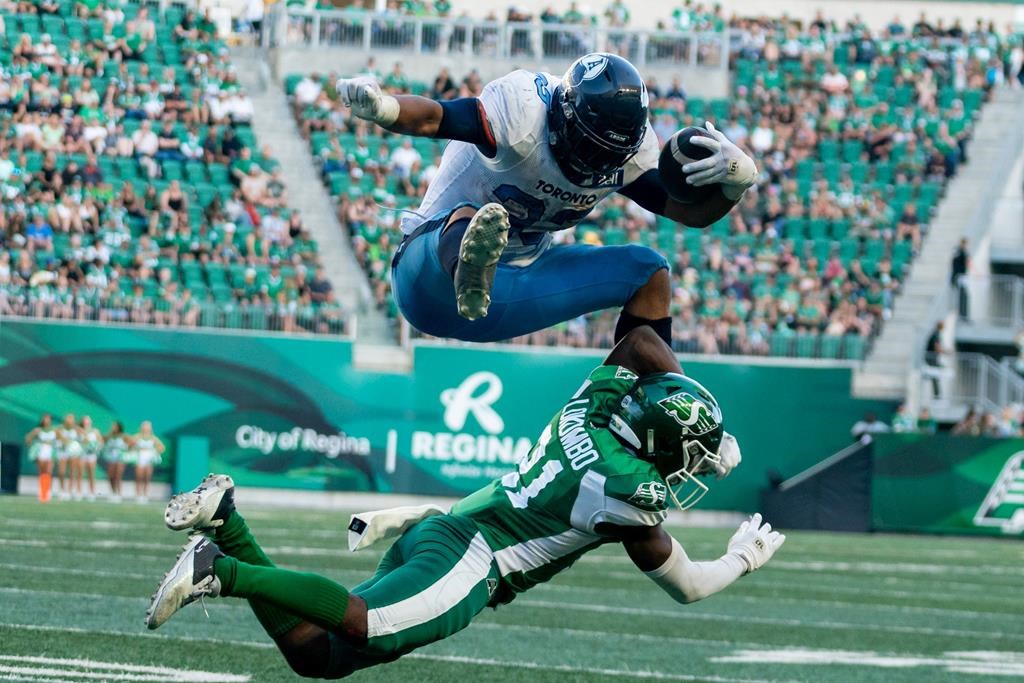 Running back Harris to remain with Argos as leader, mentor in spite of injury