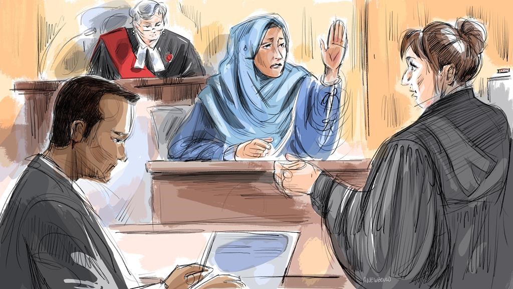 Wife of man accused of running over Toronto cop tells jury she feared for her life