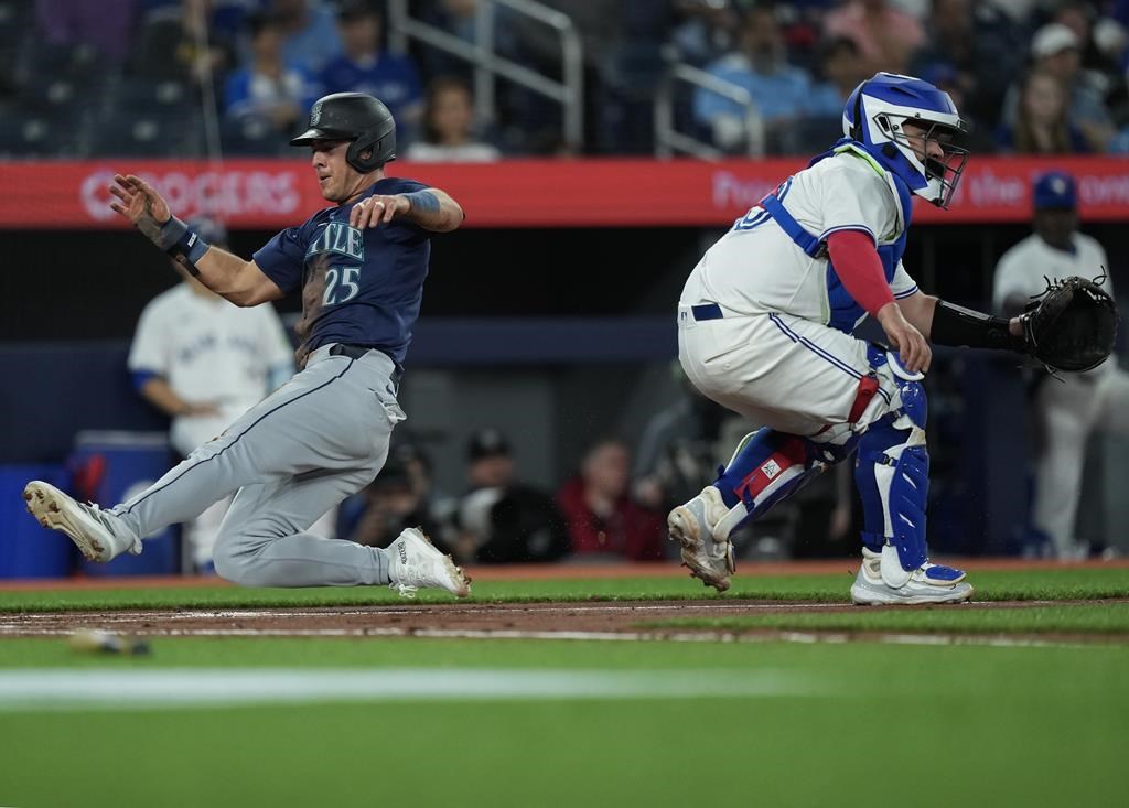 Raleigh hits two-run homer in 10th inning as Mariners top Blue Jays 6-1