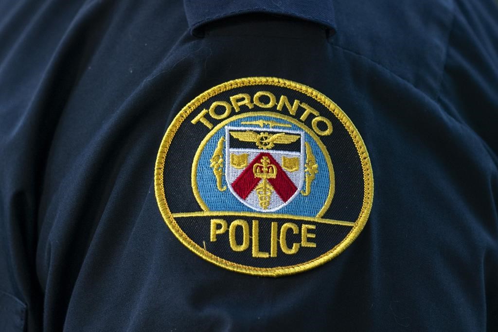 Toronto police lay murder charge after man falls from downtown balcony
