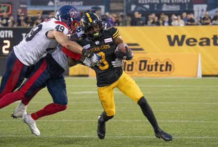 Hamilton Tiger-Cats re-sign Woods III, sign Canadian Makonzo